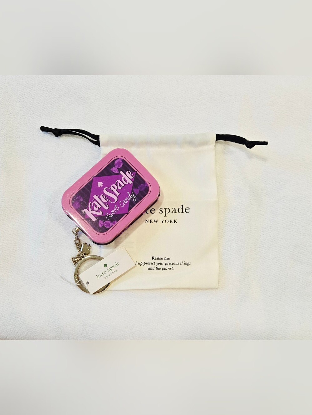 kate spade NWT Pink and Purple Sweet Candy Tin with Gold Tone Keychain